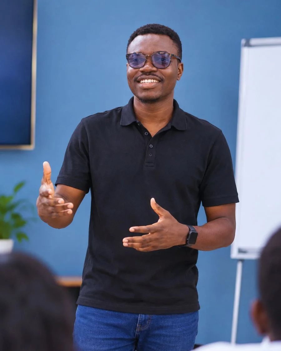 Iyanu Taiwo teaching a room of business owners